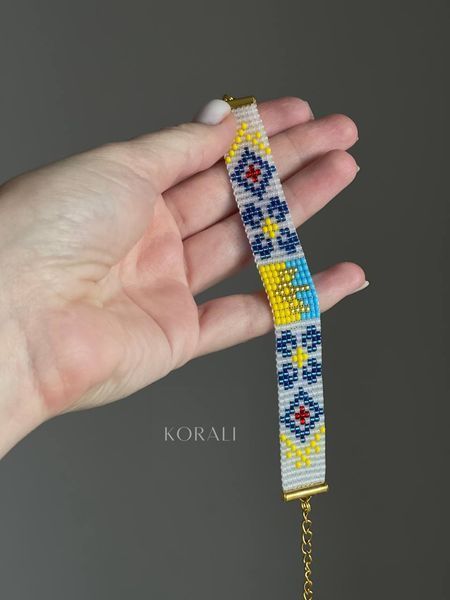 Браслет патріотичний "Розквітає Україна" з синіми квітами 918 фото