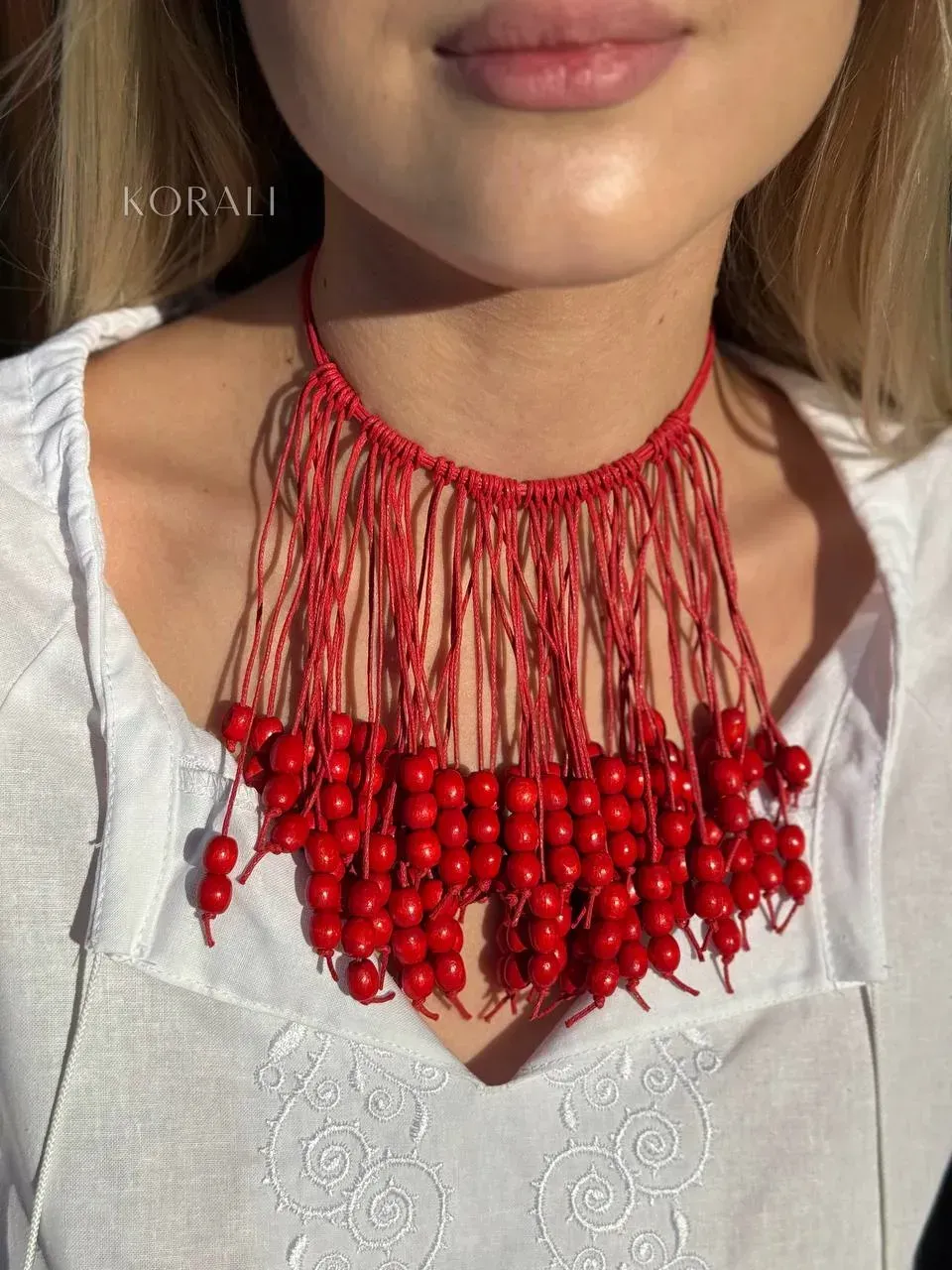 Wooden necklace "Vechornitsa" red review on a girl