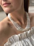 Ethno-necklace is white and transparent 41 photo