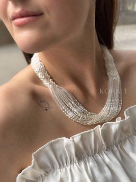 Ethno-necklace is white and transparent 41 photo