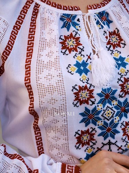 White embroidered shirt with a colorful "Star" pattern 2560 photo