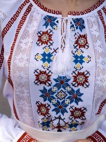 White embroidered shirt with a colorful "Star" pattern 2560 photo