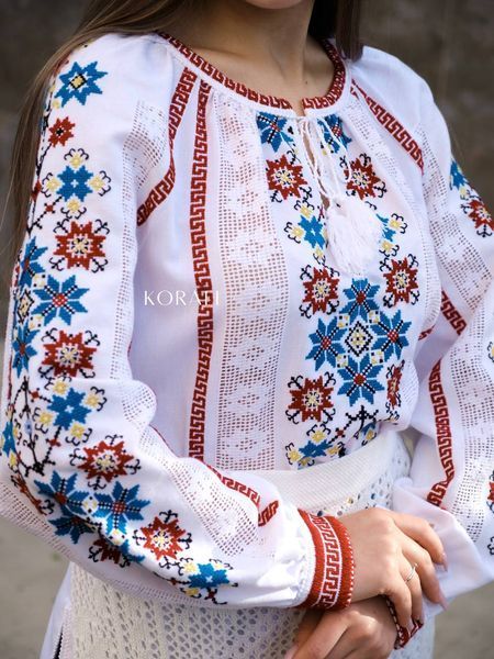 White embroidered shirt with a colorful "Star" pattern 2560 photo