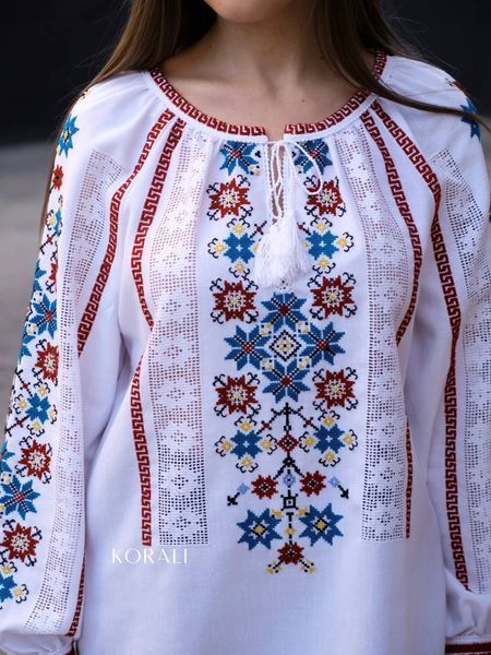 White embroidered shirt with a colorful "Star" pattern 2560 photo