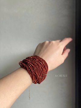 Bracelet "Constellation" brown with gold inserts 597 photo