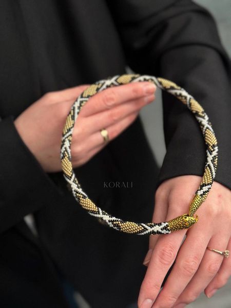 Джгут "Змійка" золотого кольору 466 фото