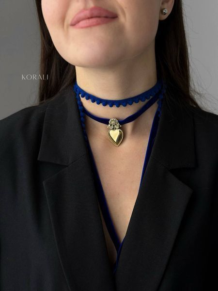 "Heart" pendant of yawns in a golden shade 398 photo