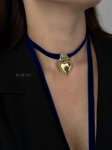 "Heart" pendant of yawns in a golden shade 398 photo