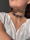 "Embroidered" choker is silver with red and black splashes 442 photo